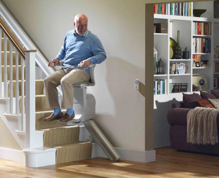 Elderly Man on a Straight Stairlift in Rochester, Erie, Ithaca, Buffalo