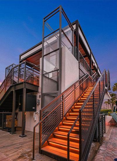 Wheelchair Lift on Outside of Building Next to Stairs in Rochester, Ithaca, NY, Morgantown, WV, Buffalo, Erie, and Pittsburgh