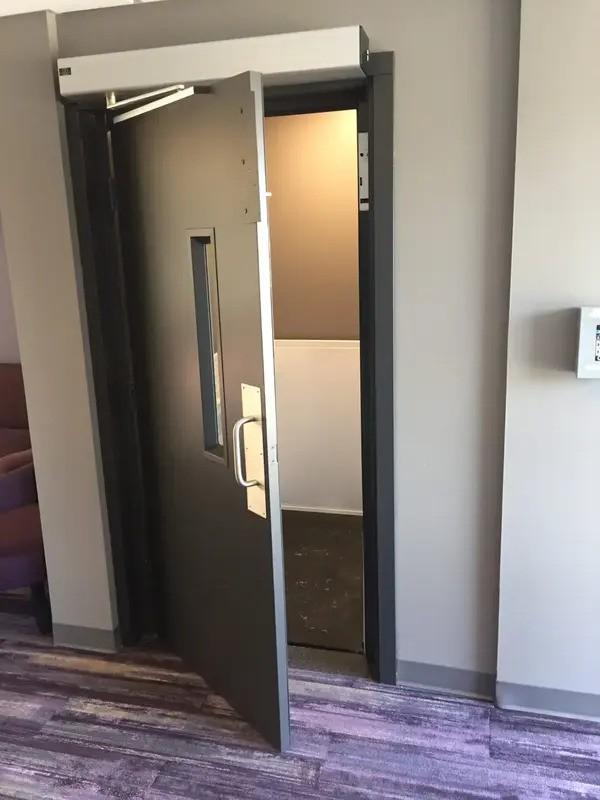 Cibes | Symmetry shaftway lift with door for discrete implementation at a business in Rochester, NY
